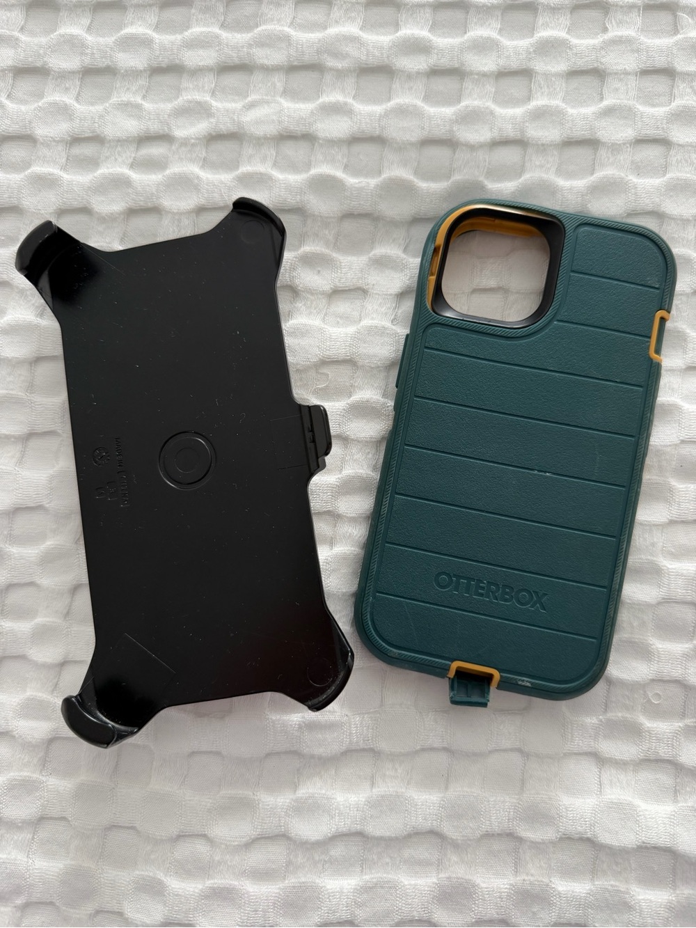 OtterBox Green Protective Phone Case for iPhone 13. With belt clip